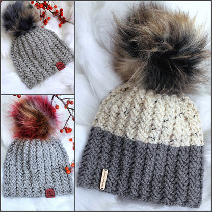 May include: Three gray crocheted hats with faux fur pom poms. The hats are all different styles, with one having a white and gray color scheme. The hats have a small tag that says "Pick Stitch Designs".