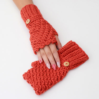 May include: A pair of orange crocheted fingerless gloves with wooden buttons. The gloves are laid out flat on a white surface.