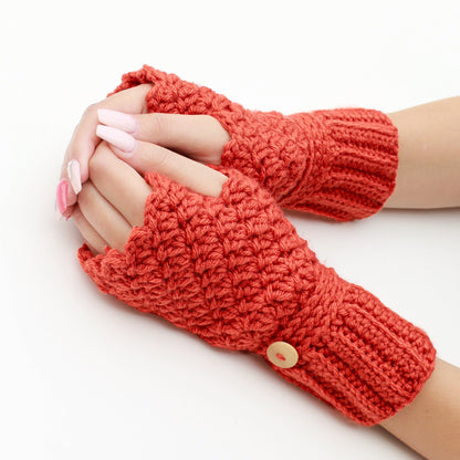 May include: A pair of orange fingerless gloves with a button detail. The gloves are made of a soft, crocheted fabric.