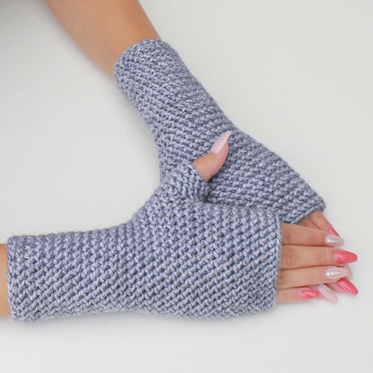 May include: A pair of gray fingerless gloves with a textured knit pattern. The gloves are made of a soft, warm material and are perfect for keeping your hands warm in the winter.