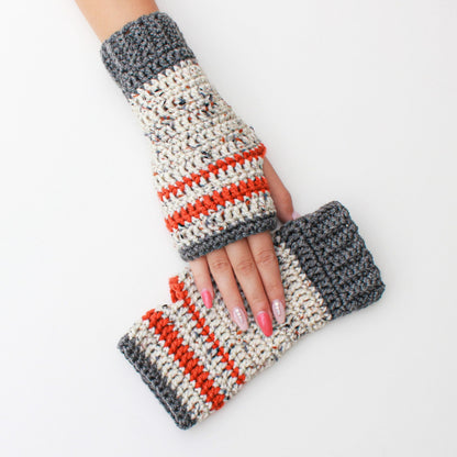 May include: A pair of fingerless gloves with a striped pattern in grey, white, and orange. The gloves are crocheted and have a textured look.