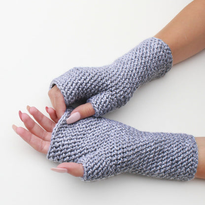 May include: A pair of gray fingerless gloves with a textured knit pattern.