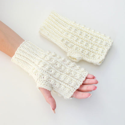 May include: A pair of white crocheted fingerless gloves with a textured design. The gloves are made with a soft yarn and have a comfortable fit.