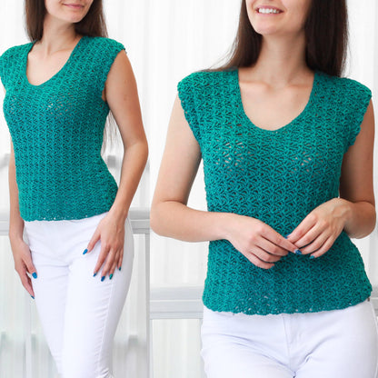 May include: A teal crochet top with a scoop neck and short sleeves. The top is made with an open stitch pattern, creating a lightweight and airy feel.