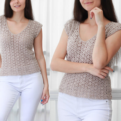 May include: A beige crochet top with a V-neck and short sleeves. The top is made with a delicate open stitch pattern.