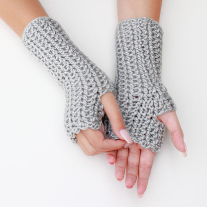 May include: A pair of gray fingerless gloves made of crocheted yarn. The gloves are shown on a white background.