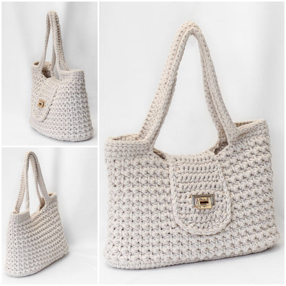 May include: A cream-colored crocheted tote bag with a flap closure and a gold clasp. The bag has two long straps.