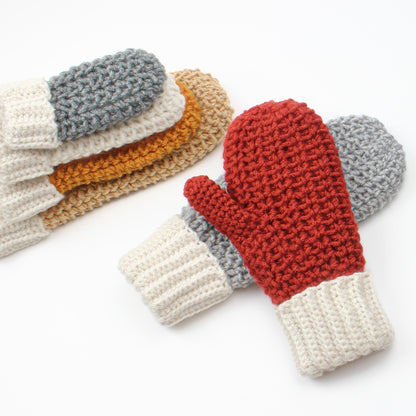 May include: A set of five crocheted mittens in various colors, including red, gray, white, and yellow. The mittens are made with a textured stitch and have a simple cuff.