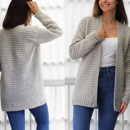May include: A long-sleeved, light gray cardigan with a waffle knit texture. The cardigan has a V-neck and is open in the front.