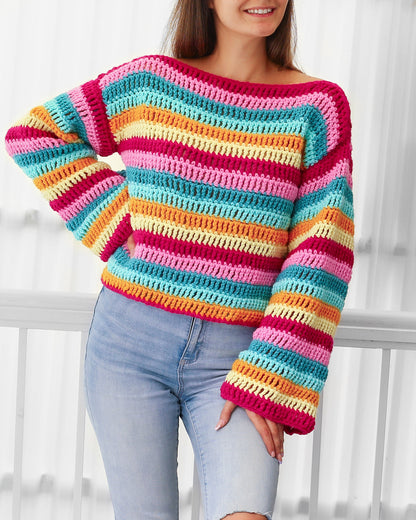 May include: A colorful striped crochet sweater with long sleeves. The sweater is made with a variety of bright colors, including pink, orange, yellow, and blue.