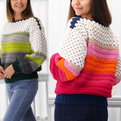 May include: A colorful striped crochet sweater with a white crocheted bodice. The sweater has a wide, boat neck and long sleeves. The stripes are in shades of pink, orange, green, and blue.