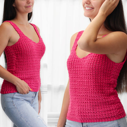 May include: A pink crochet tank top with a v-neck and a textured pattern.