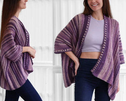 May include: A purple and pink striped crochet cardigan with a loose fit and a slightly asymmetrical hem.