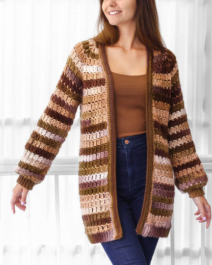 May include: A long, brown, beige, and green striped crochet cardigan with a V-neck and long sleeves.