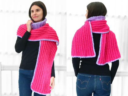 May include: A pink and purple crocheted scarf with a ribbed texture. The scarf is worn around the neck and can be styled in different ways.