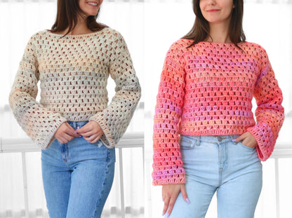 May include: Two crochet sweaters, one in cream and the other in shades of pink and orange. Both sweaters have a loose, open weave design with long, flared sleeves and a boat neck. The sweaters are paired with blue jeans.