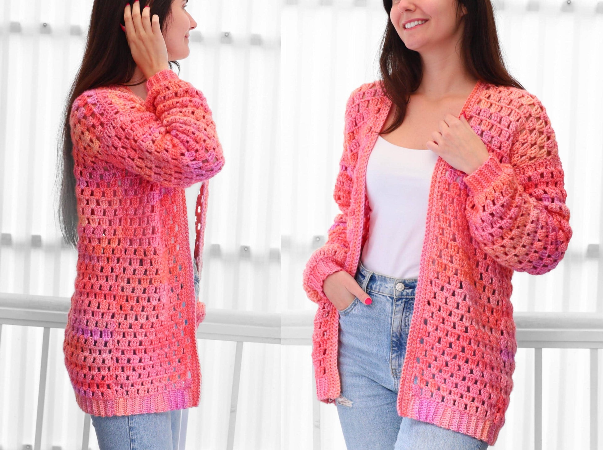 May include: A long, open-front crochet cardigan in shades of pink, orange, and purple. The handmade sweater features a textured, open weave design with long sleeves and a relaxed fit. The cardigan is worn over a white top and blue jeans.