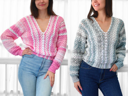 May include: Two V-neck sweaters, one pink and white, the other blue and white. Both sweaters have a textured, open weave design. The pink sweater has a gradient effect, while the blue sweater has a more muted color scheme. Both are paired with blue jeans.